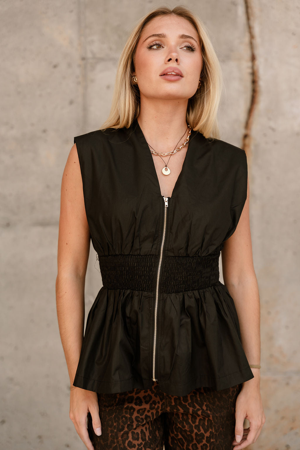 Gia Black & Gold Zip-Up Flare Tank- close up front view