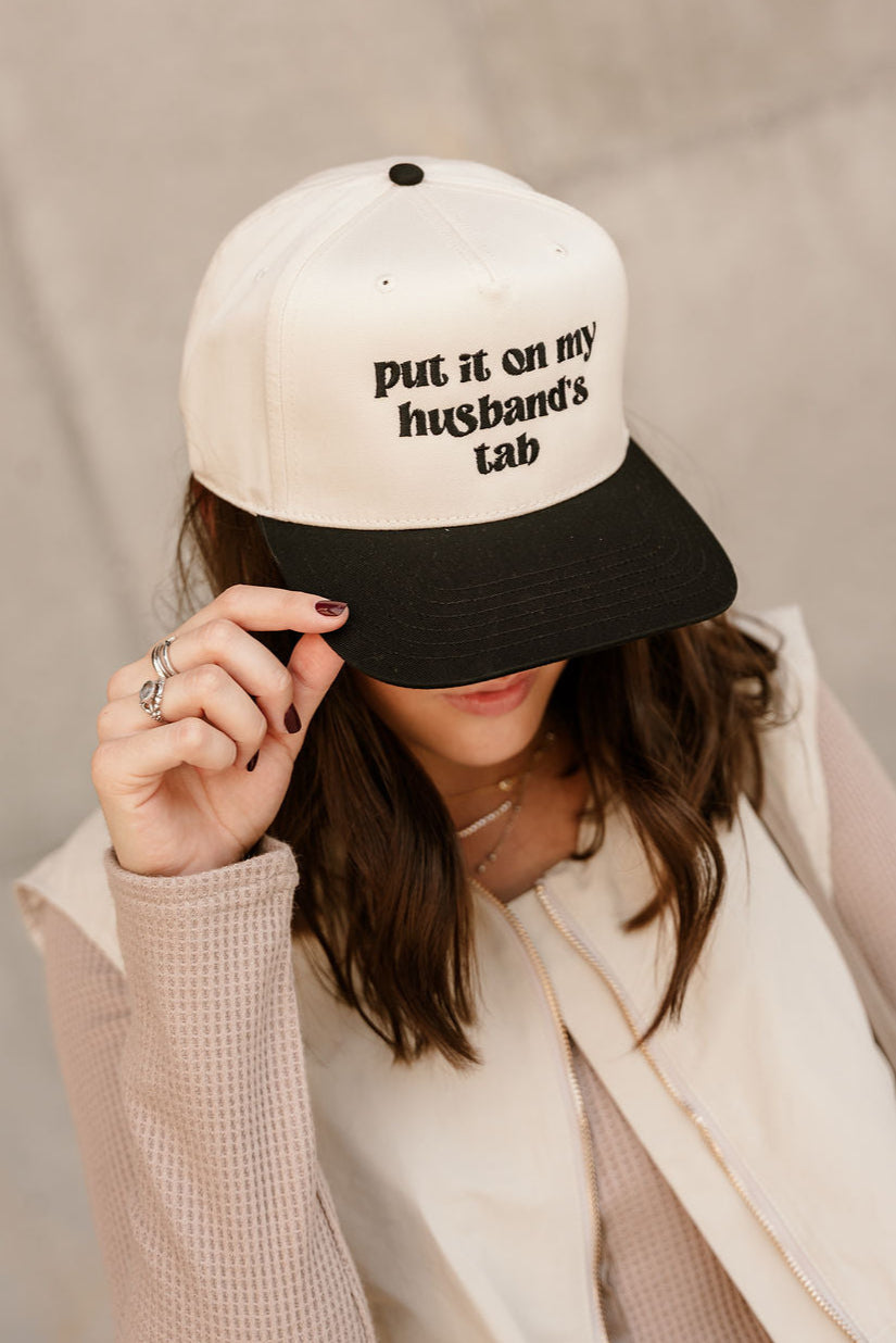 Put It On My Husband's Tab Trucker Hat - shown on model