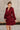 Selah Burgundy Satin Flare Mini Dress- frontal left side view