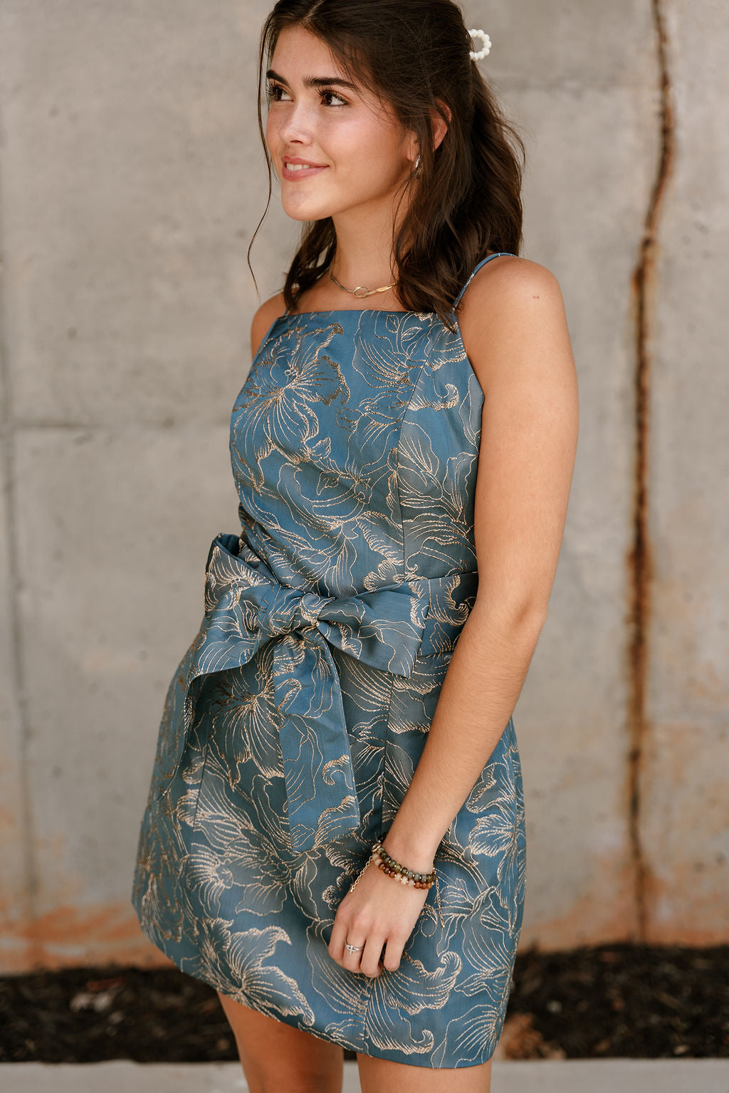Jenna Blue & Gold Floral Tie Waist Mini Dress- frontal side view