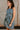Jenna Blue & Gold Floral Tie Waist Mini Dress- frontal side view