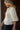 Tasha Cream Tie-Neck Pleated Top - close side view