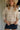 Della Cream & Beige Mock Neck Sweater - close up front view
