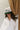 Sorry I'm A Hugger Green Trucker Hat - front view of hat on model