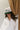 Sorry I'm A Hugger Green Trucker Hat - front view of hat on model