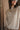 Emmerson Beige Mock Neck Top -  close up front view
