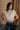 Tegan Cream Sleeveless Turtleneck Sweater - front view