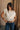 Tegan Cream Sleeveless Turtleneck Sweater - front 