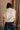 Tegan Cream Sleeveless Turtleneck Sweater - back view
