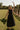full body front view of the Augusta Black Buckle Midi Dress