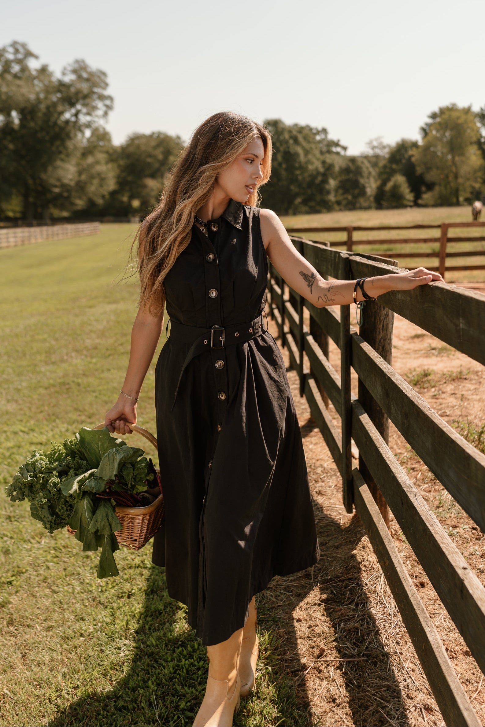 full body front view of the Augusta Black Buckle Midi Dress
