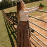 full body front view of the Vittoria Brown Tiered Maxi Skirt