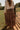 back view of the Vittoria Brown Tiered Maxi Skirt