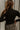 Shannon Black Ribbed Mock Neck Top - back view