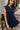Wren Navy Flare Sleeveless Mini Dress - close up front view