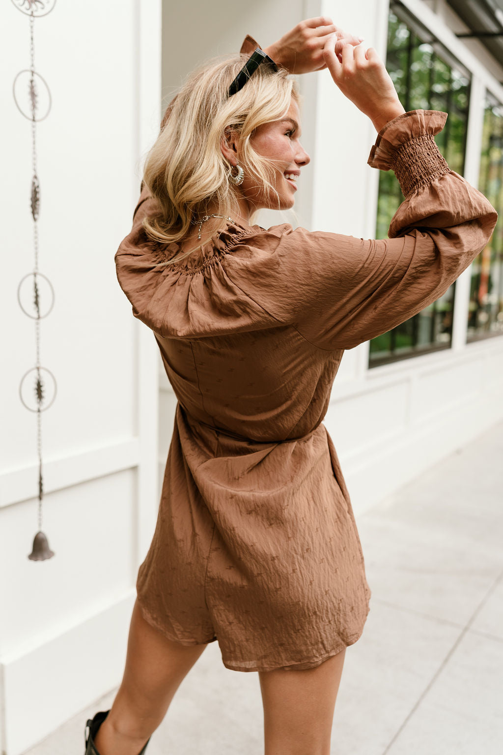 Kennedi Brown Long Sleeve Romper- close up back view