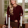 Bridgette Burgundy Side Slit Cardigan - front view at table