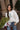 Freya Green & Cream Christmas Tree Stitch Sweater- front view - holiday background