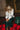 Grace Cream & Black Stitch Bows Sweater- full body sitting view - holiday background