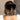 Image shows back of model's hair. Model is wearing the Stacia Velvet Hair Bow in Black that features black velvet fabric with gold dot embellishments and a clasp closure.