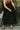 Loren Black Sleeveless Corset Midi Dress- close up bottom front view