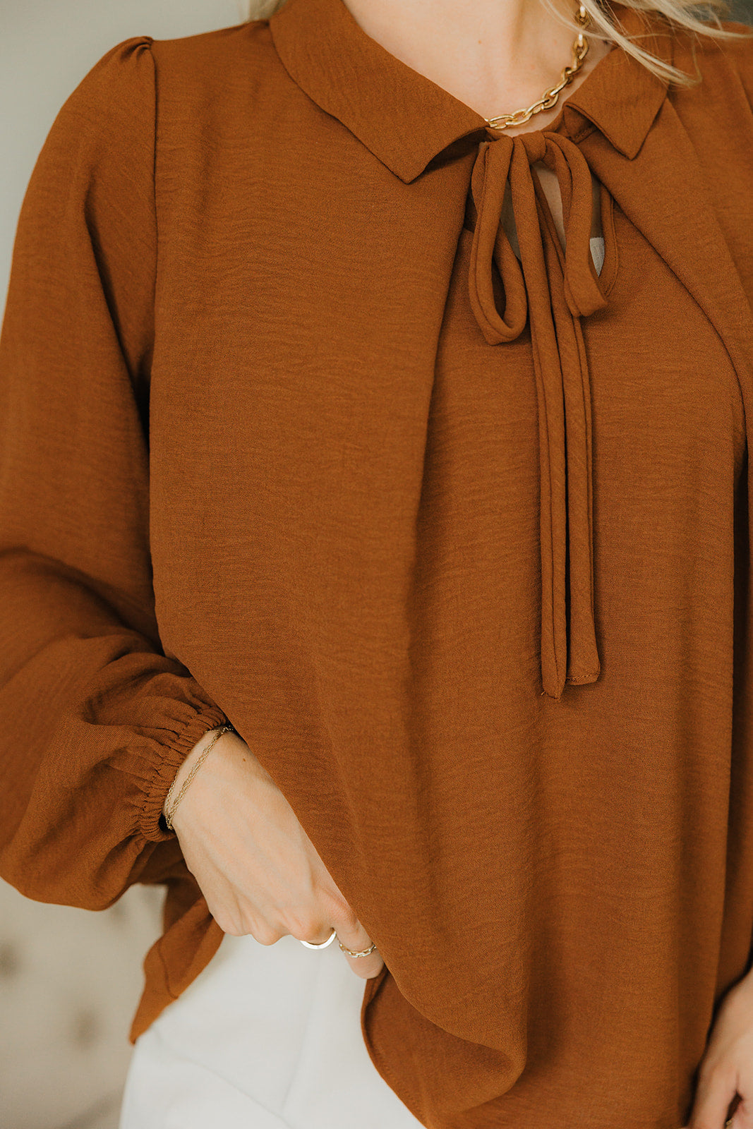 Everly Rust Brown Tie Top- close up front view