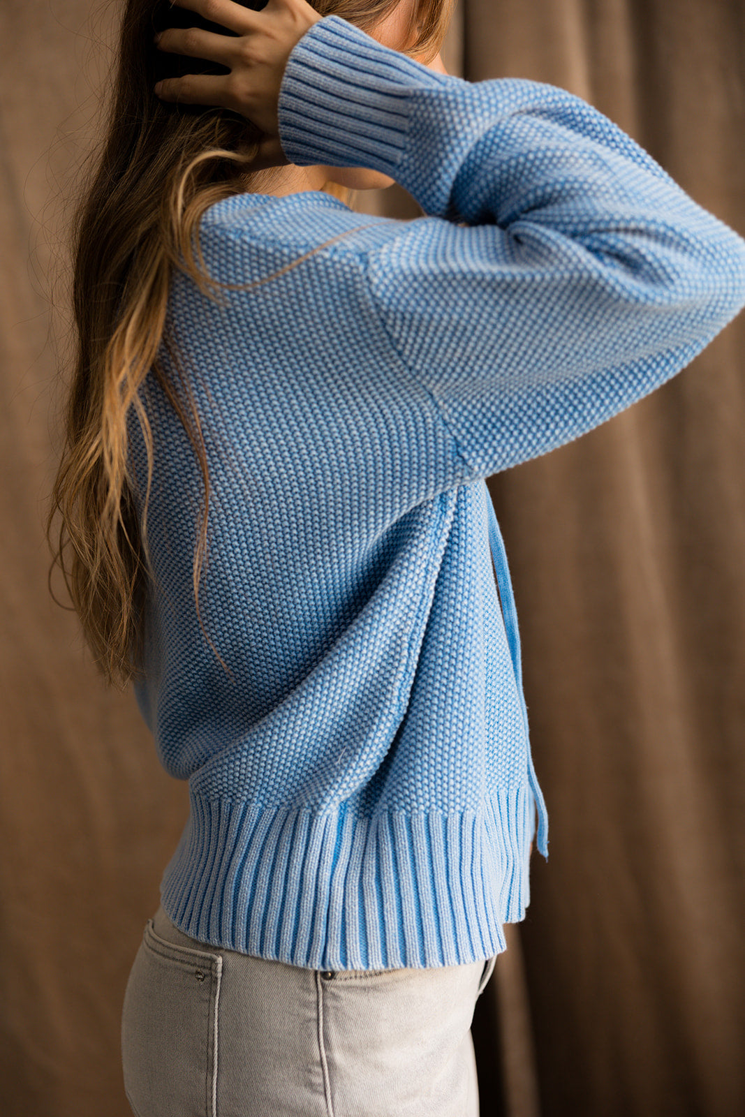 Mina Washed Blue Hoodie Sweater- close up side view