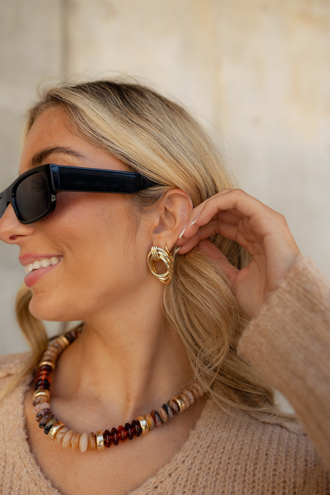 Nora Gold Teardrop Dangle Earring-close up side view