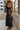 Gemma Black Faux Leather Midi Skirt- side view