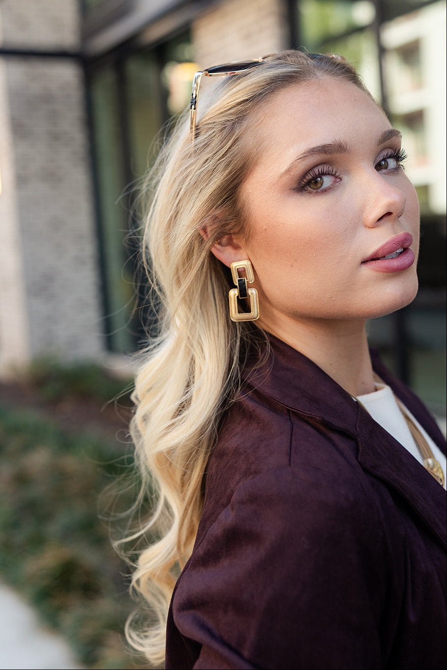 Miriam Gold & Black Leather Chain Earrings- front side view