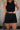 Front view of female model wearing the Katherine Tortoise Buttoned Shorts in Black which features Cotton Fabric, Two Front Pockets, Two Back Pockets, Belt Loops and Front Zipper with Tortoise Button Closure