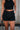 Front view of female model wearing the Katherine Tortoise Buttoned Shorts in Black which features Cotton Fabric, Two Front Pockets, Two Back Pockets, Belt Loops and Front Zipper with Tortoise Button Closure
