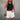 Front view of female model wearing the Katherine Tortoise Buttoned Shorts  in White which features Cotton Fabric, Two Front Pockets, Two Back Pockets, Belt Loops and Front Zipper with Tortoise Button Closure