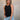 Front view of female model wearing the Brielle Black Sleeveless Tank which features Black Lightweight Fabric, Round Neckline and Sleeveless