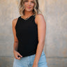 Front view of female model wearing the Brielle Black Sleeveless Tank which features Black Lightweight Fabric, Round Neckline and Sleeveless