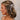 Side view of female model's hair; model is wearing the Melrose Hair Bow Barette in cream that has a barrette with a thin ivory bow..