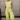 Full body view of female model wearing the Alexis Green Sleeveless Jogger Jumpsuit which features  Light Green Knit Fabric, Jogger Pant Legs, Side Pockets, Drawstring Tie Waistband and overlap Open Back with Button Closure