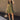 Full body view of model wearing the Holly Olive Mini Dress. This is a green mini dress with a zipper up the front and ruffled bottom, V neckline, sleeveless.