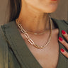 Close up of model wearing the Melanie Gold Chain Necklace. This is a gold chain necklace. 