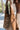 Faye Brown Leather Shoulder Purse- close front view in model's hand