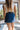 Celine Dark Denim & Gold Buttons Mini Skirt- back view
