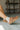 Joia Brown Suede Slide-On Clog Mule- side view on model