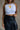 Nylah Black Faux Leather Pleated Skirt- close up front view