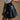 Nylah Black Faux Leather Pleated Skirt- close up side view