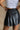 Nylah Black Faux Leather Pleated Skirt- close up back view