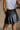 Nylah Black Faux Leather Pleated Skirt- back view