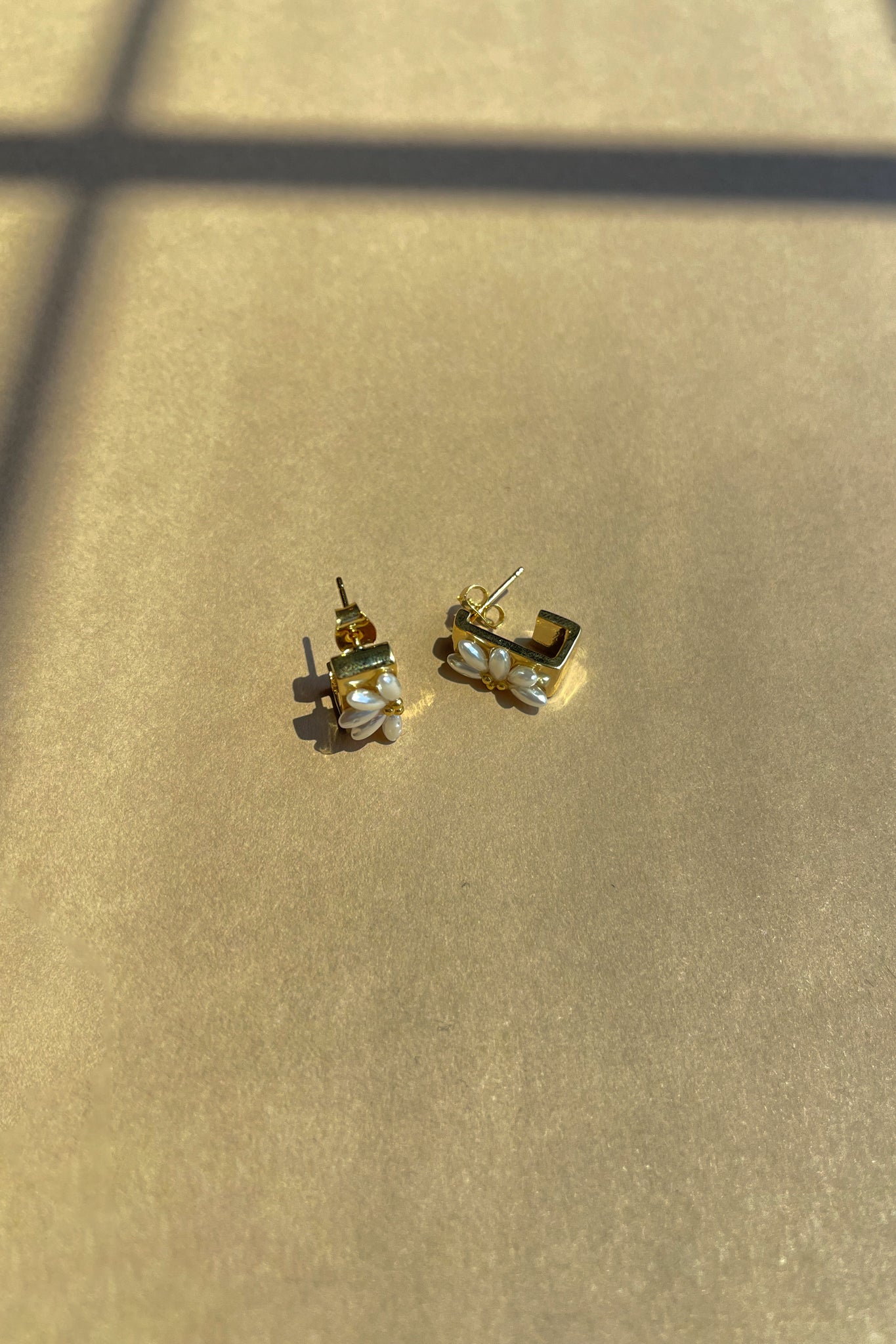 Rosie Gold & Pearl Flower Square Huggie Earring- close up view