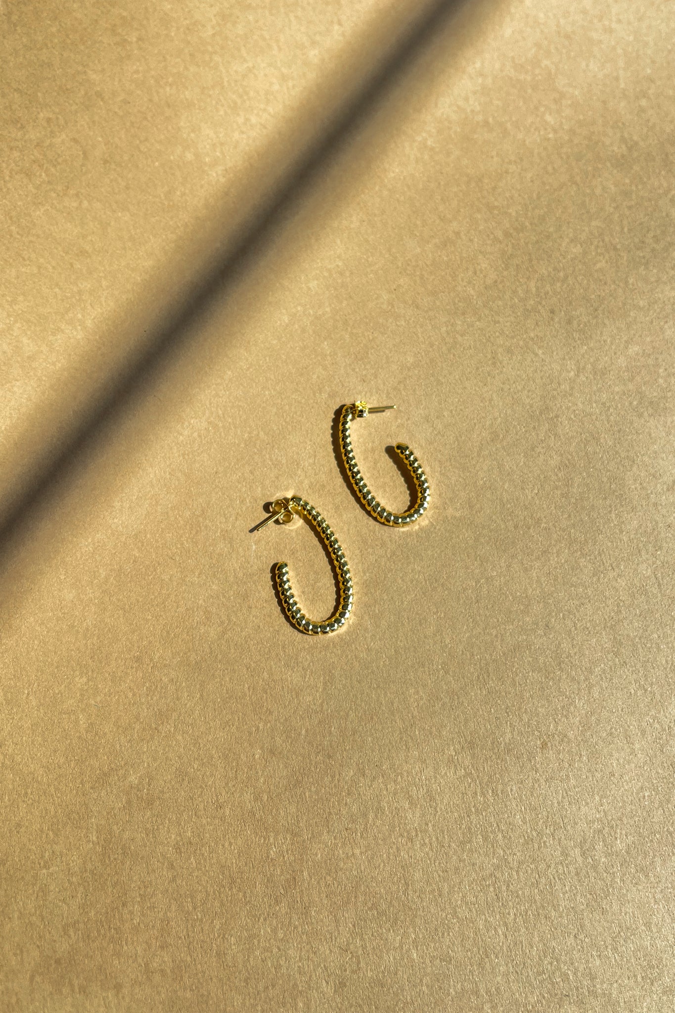 Julia Gold Filled Scoop Beaded Hoop Earring- flat lay view