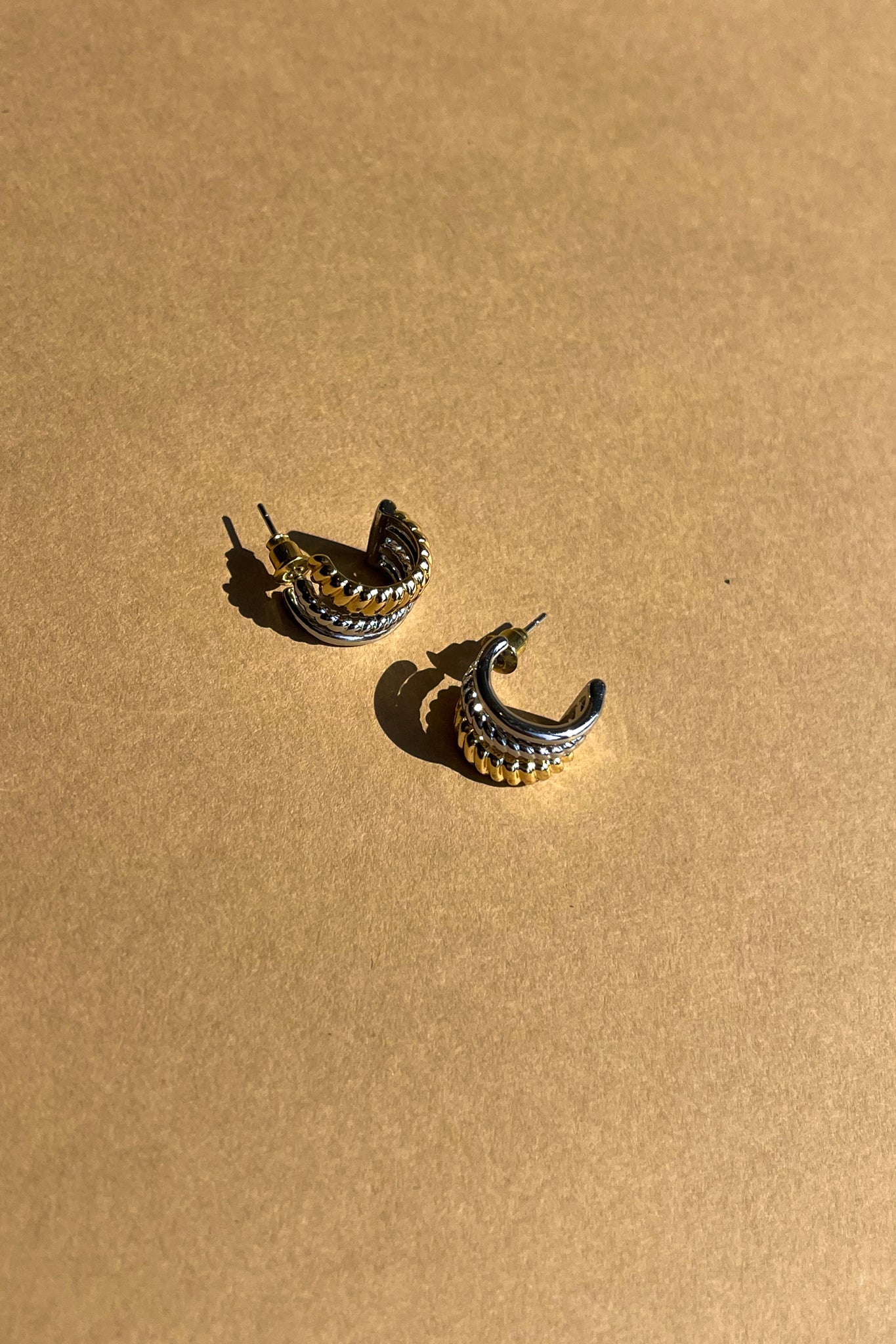 Eliana Gold & Silver Ribbed Scoop Studs- close up view
