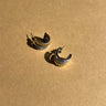 Eliana Gold & Silver Ribbed Scoop Studs- close up view